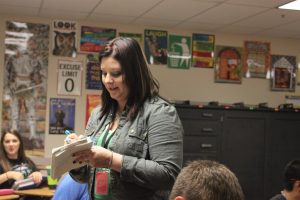 Mrs. Walker takes attendance in her sophomore english class. 